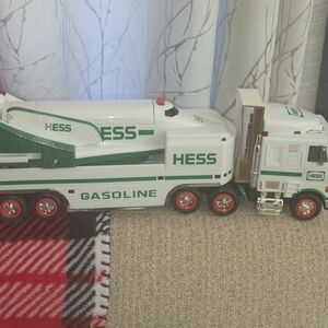 White and Green Toy Truck with Multi-Axle Trailer